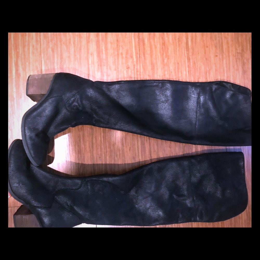 Thigh high black boots